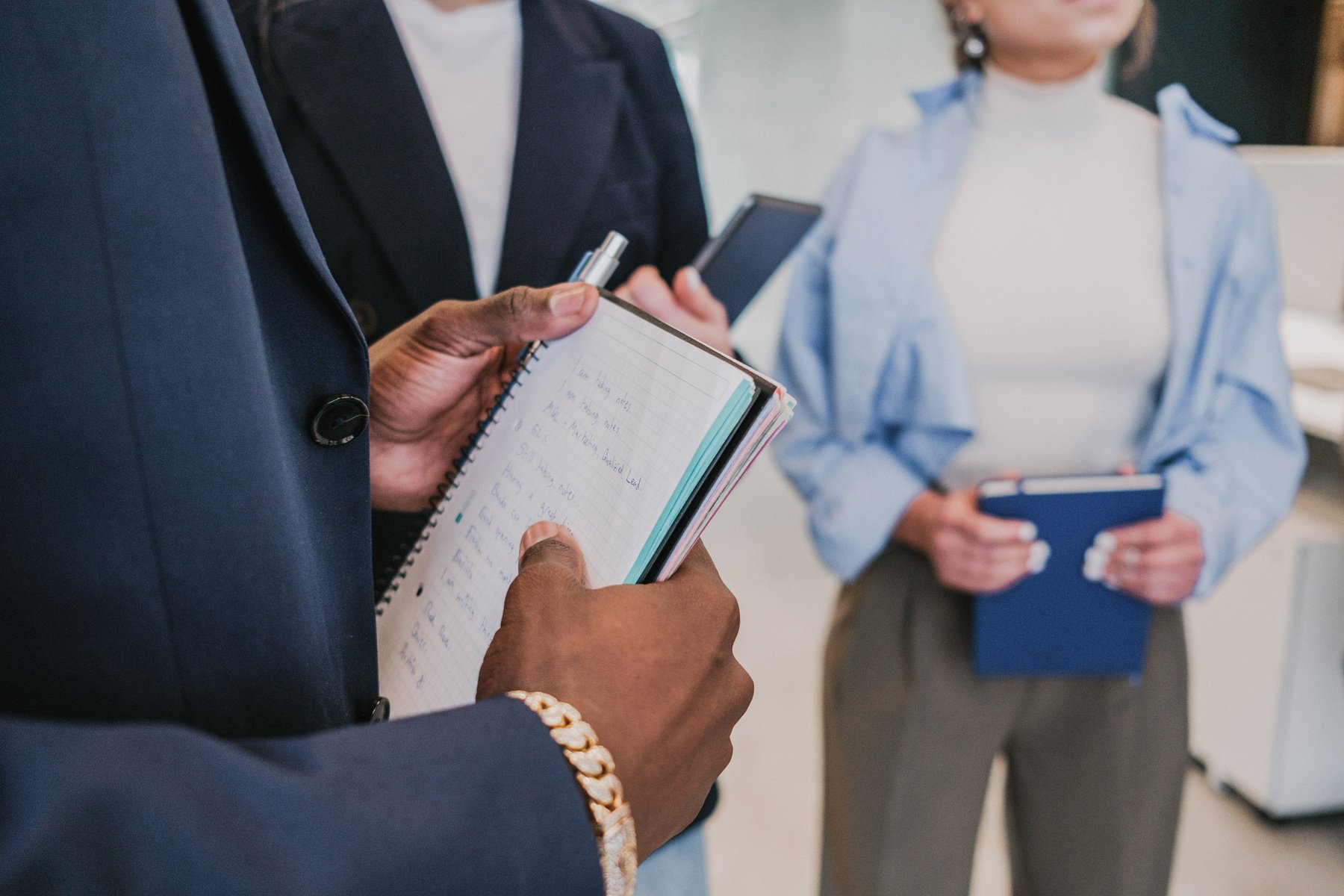 Cool Corporate Employees Holding Notebooks